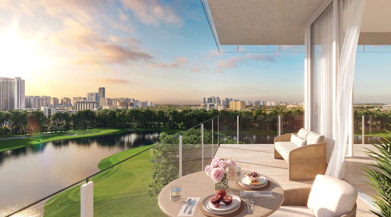 Spacious Balcony View from a Residence at Shell Bay Showcasing Panoramic Vistas of the Private Golf Course and the Hallandale Beach Cityscape, Illustrating the Luxurious Resort Living in South Florida