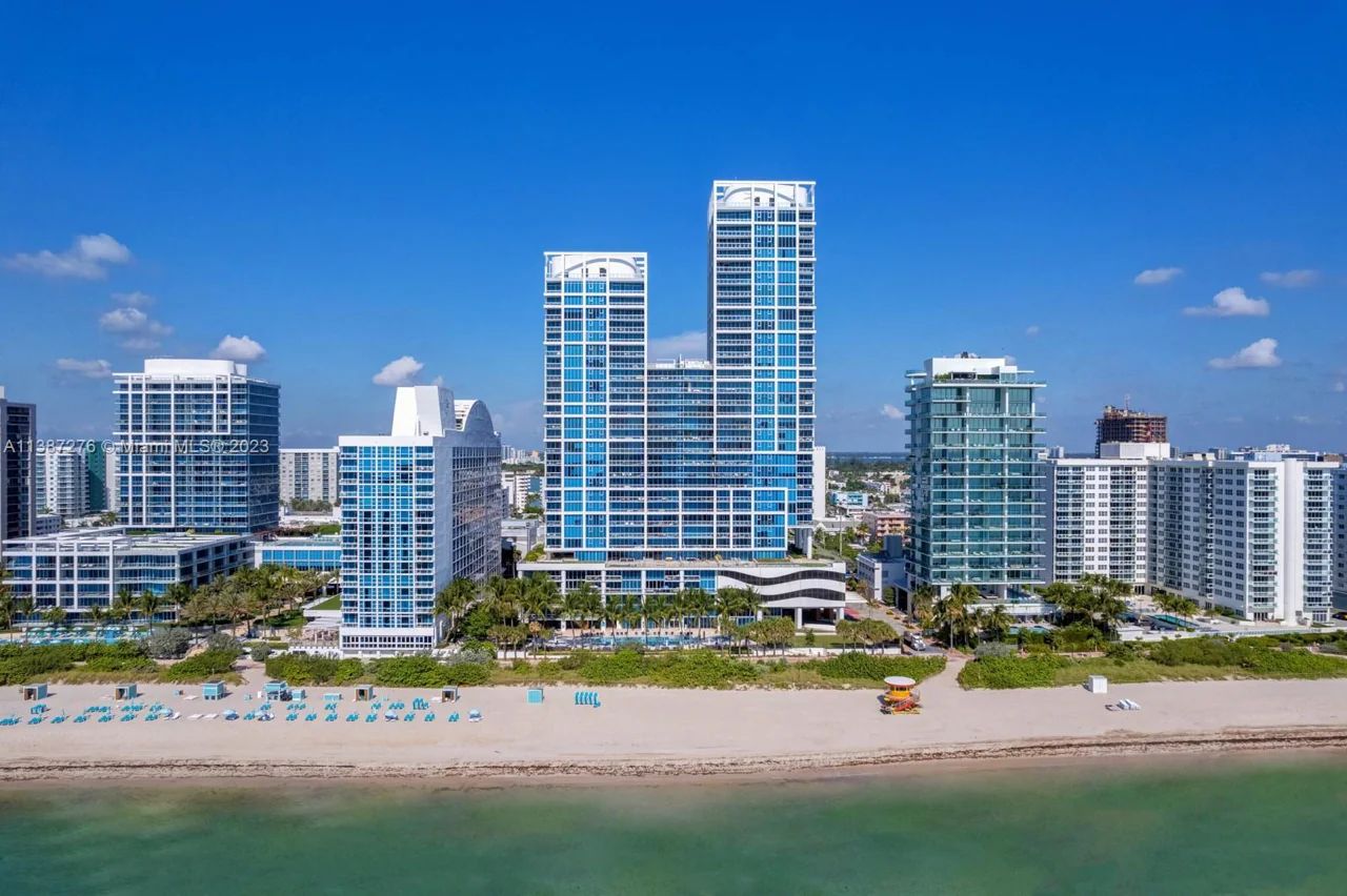 An Aerial View of Miami Beach with The Carillon North Tower in the Foreground