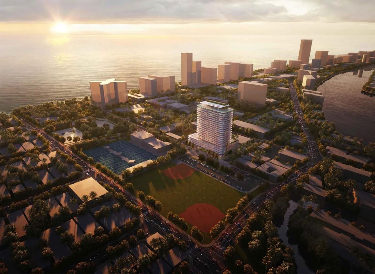 Vista aérea al atardecer del complejo del edificio 72 Park rodeado de vegetación y agua en Miami Beach