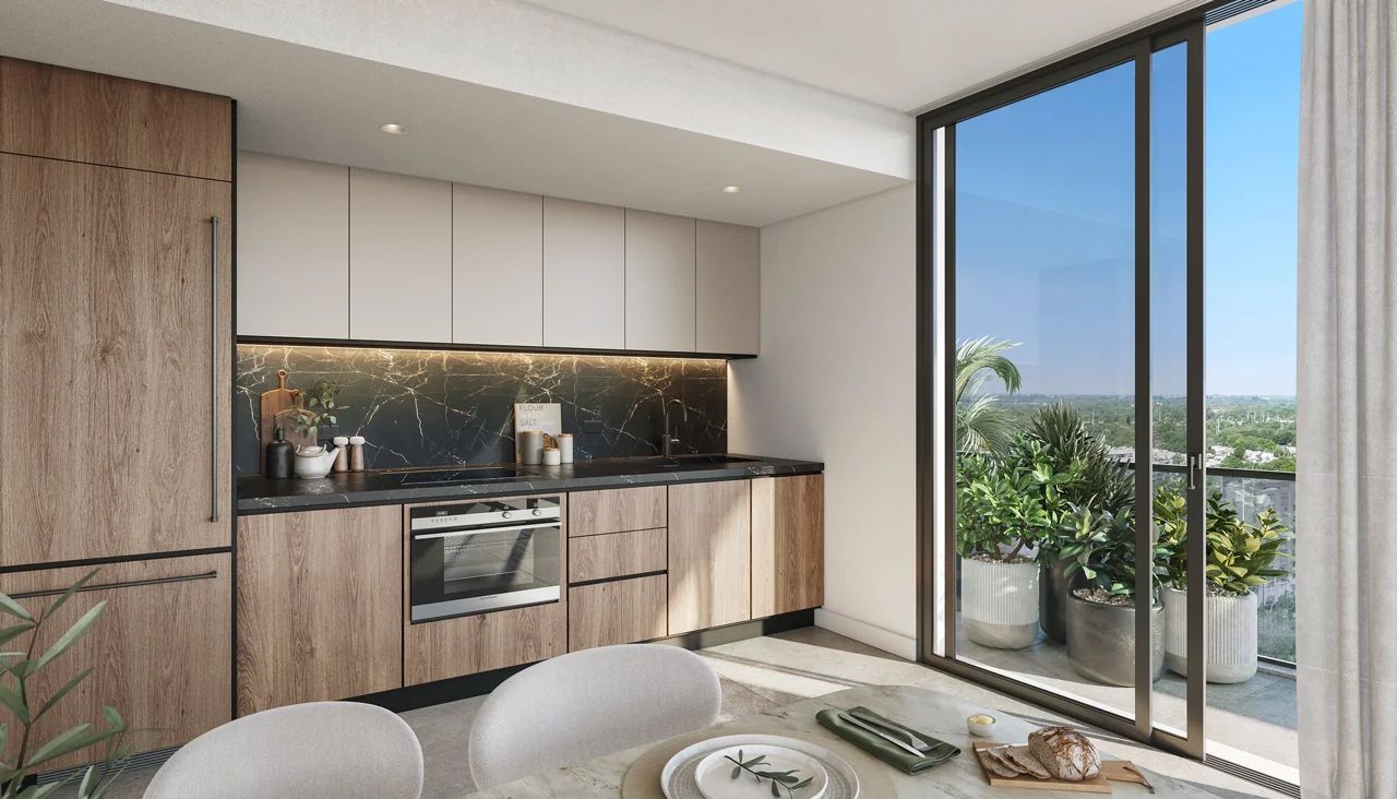 Cocina Totalmente Equipada Estilo Europeo en Nexo Residence con Encimeras de Cuarzo y Electrodom&eacute;sticos de Alta Gama