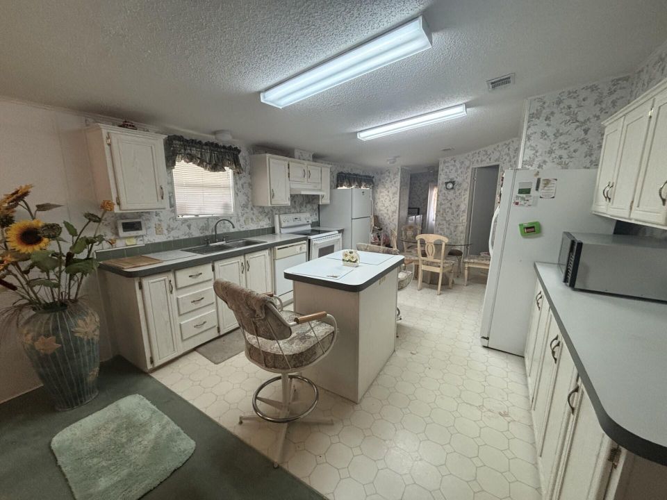 For Sale: $115,000 (4 beds, 2 baths, 2084 Square Feet)