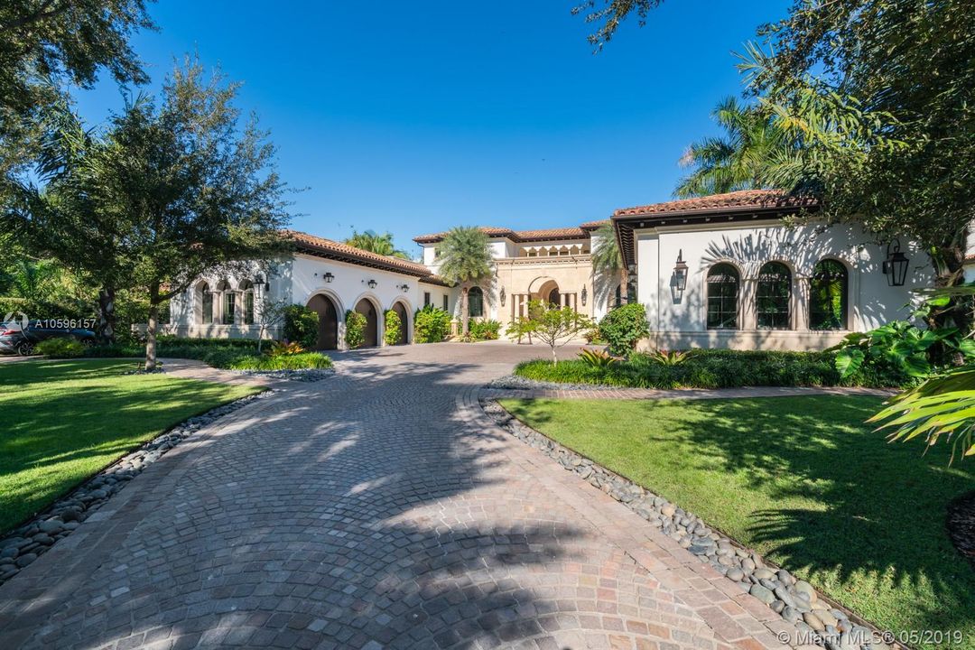 Driveway Leads to Main Entrance and 6-Car Garage