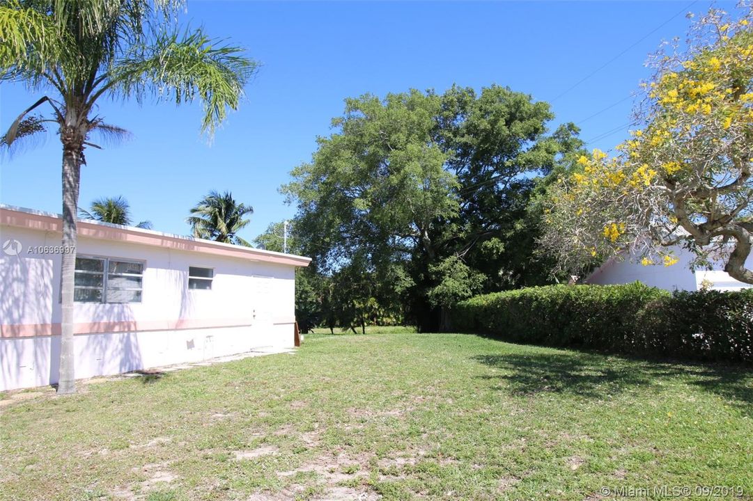 EAST SIDE VIEW OF SPACIOUS YARD