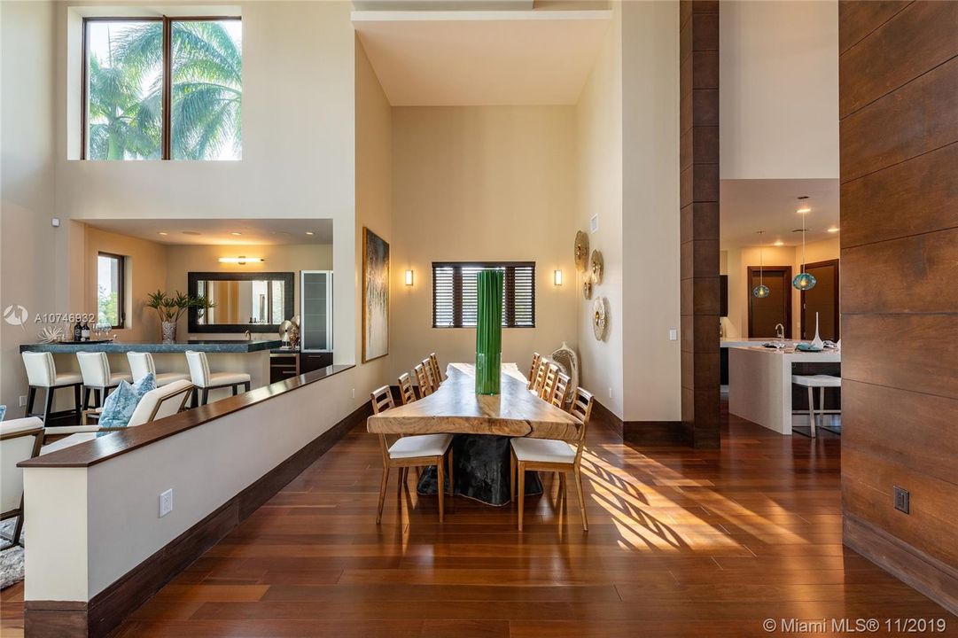 Large dining room with space to seat 12 or more.  Perfectly positioned between wet bar/entertainment area and kitchen/lounge area.  Lighting source available for your chandelier.
