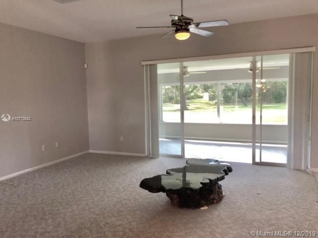 Living room which opens to Florida room