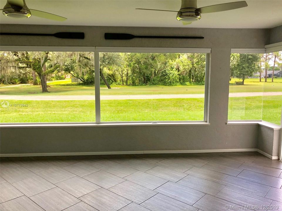 Florida room with golf course view