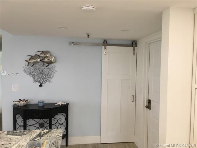 Entrance foyer area with storage closet