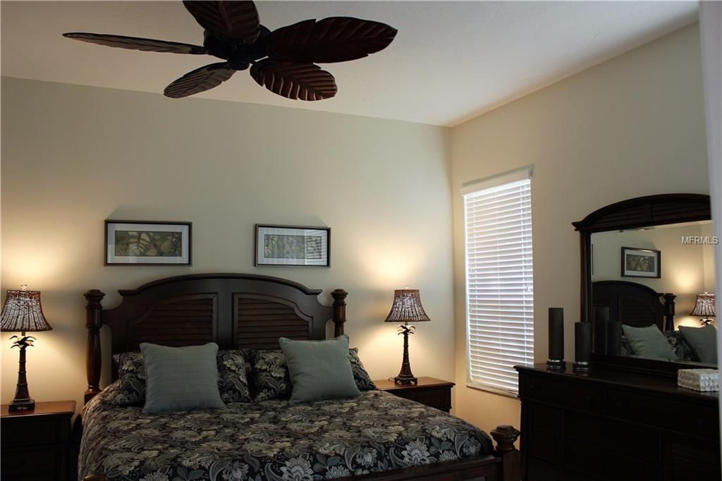 Turns down the lights and this Master bedroom is as romantic as it is functional......