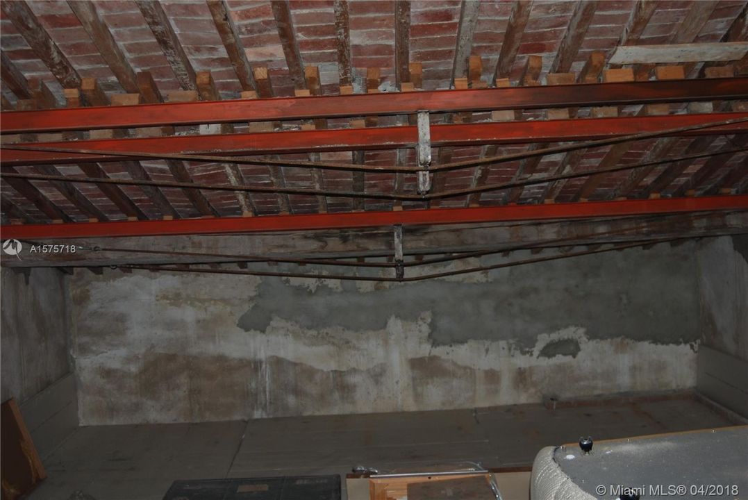 A glimpse of history  ... wood beams and brick ceiling on the very top floor, where the loggia and rooftop are