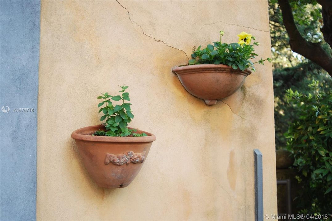 Planters affixed to the walls ...Details everywhere you turn