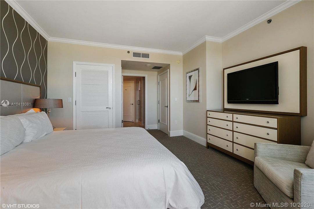Master bedroom with walk in closet and on suite bathroom