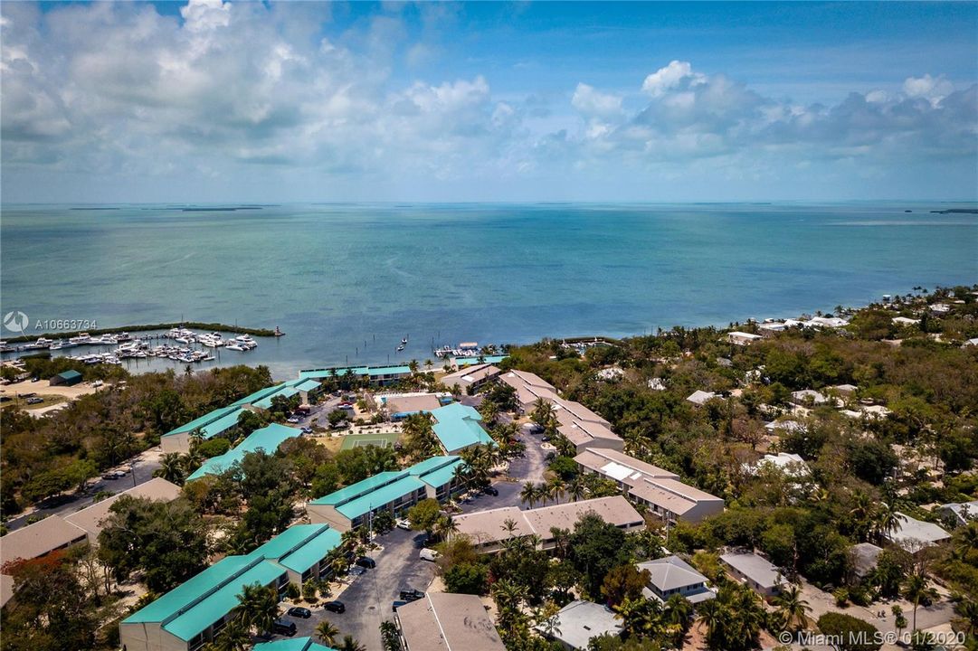 Community is installing NEW metal roofs to protect front he elements. Seller has ALREADY PAID for the assessment. Just bring your bathing suits and hit the ocean. Snorkel in the area or Kayak though the Ocean. WELCOME TO YOUR ISLAMORADA VACATION HOME