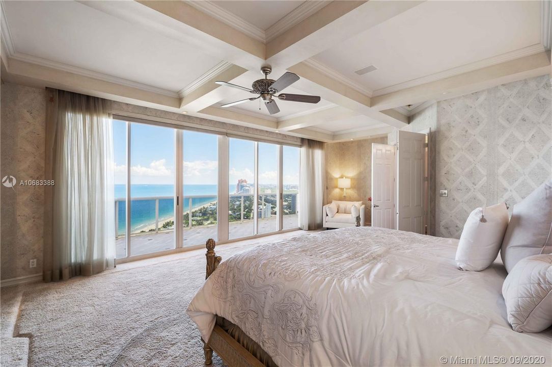 Motorized drapes in bedroom for easy opening