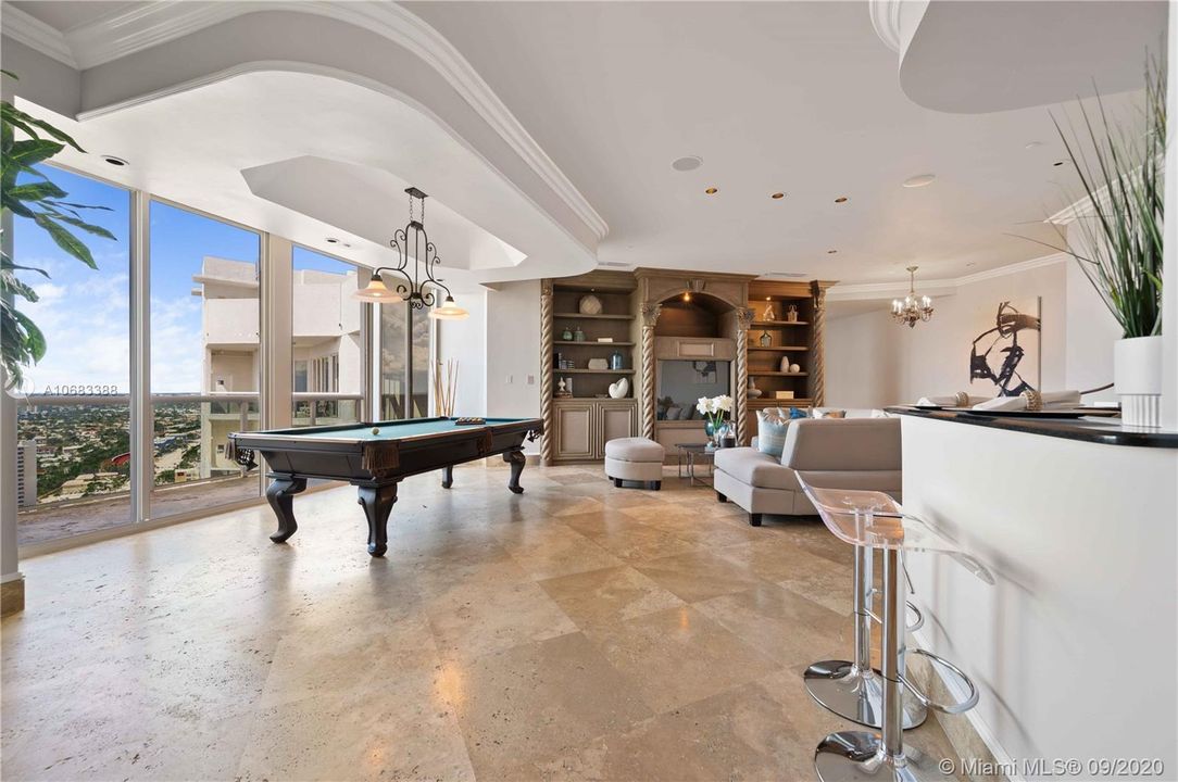 Back of residence has private entrance and large family room