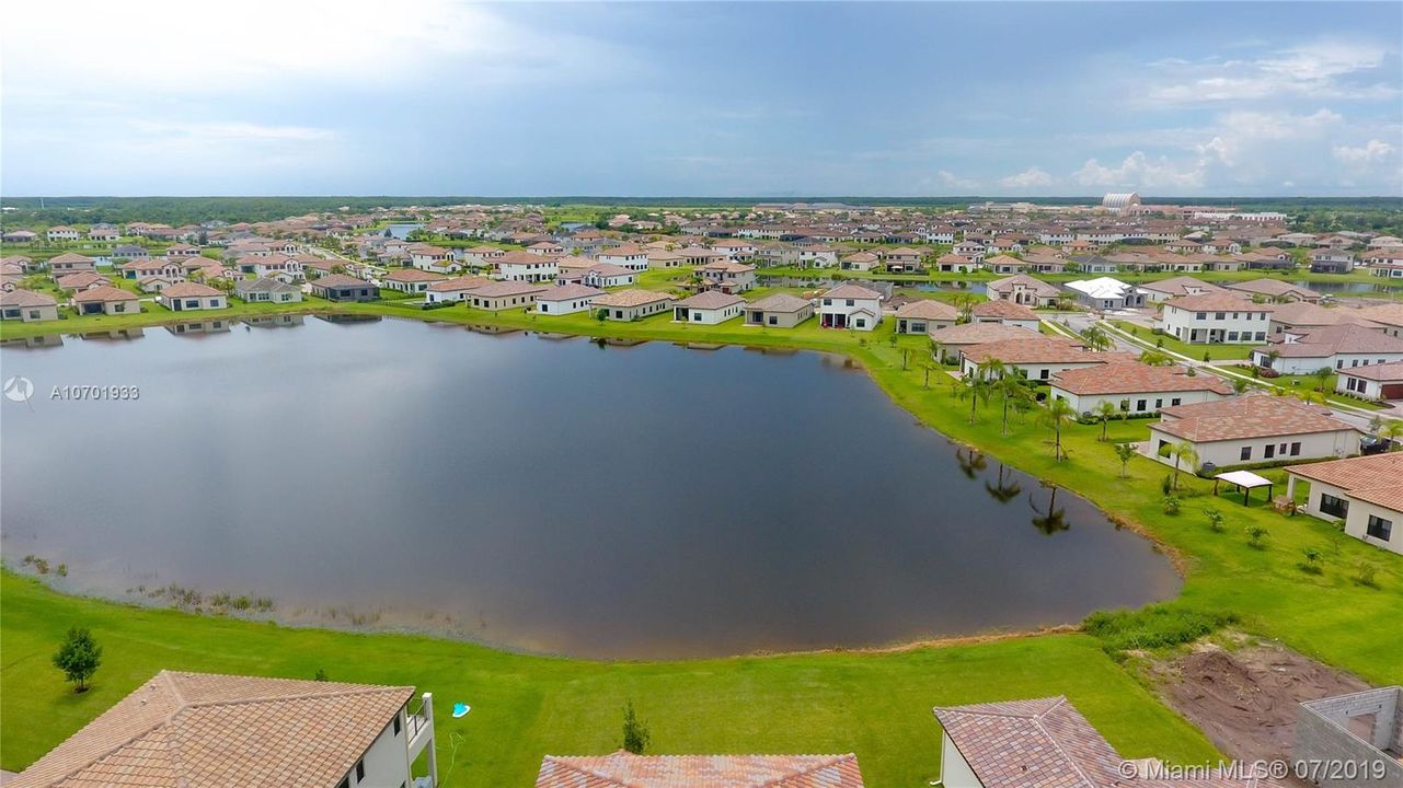 aerial view of the home and the lake