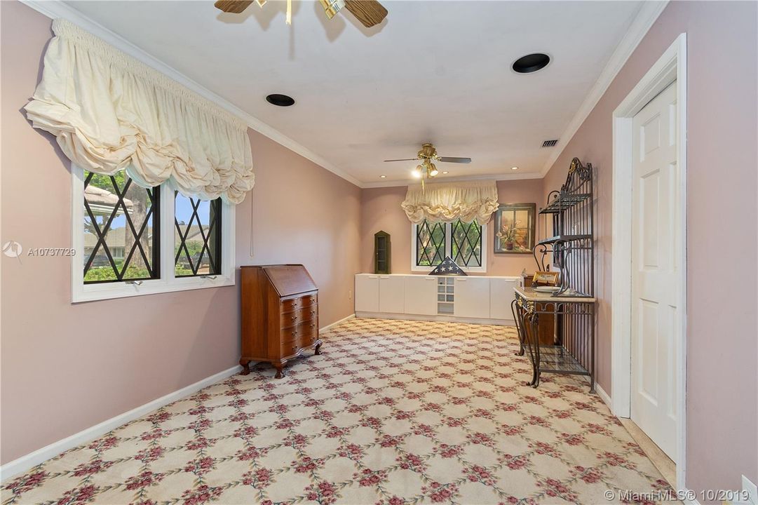 This Den is adjacent to the Office can be made part of a His/Hers office or a room adjoining the Office.