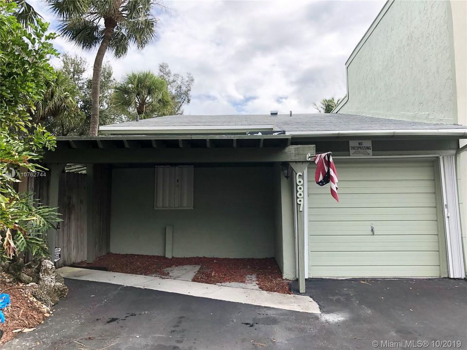 one car garage and carport.