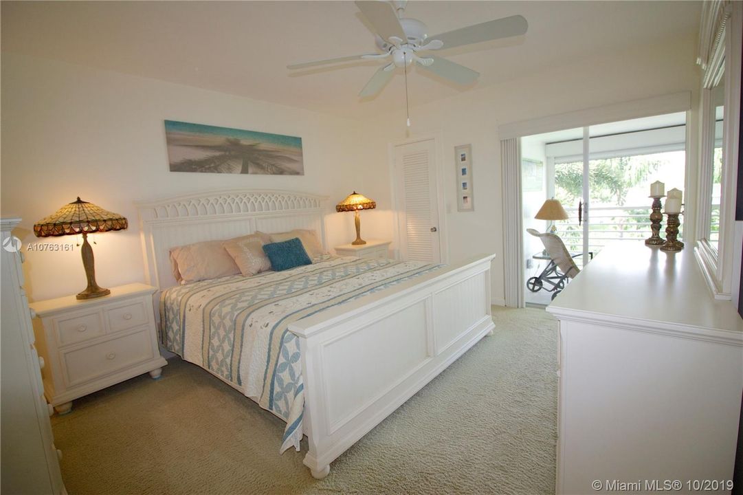 Master Suite open to covered/screened lanai