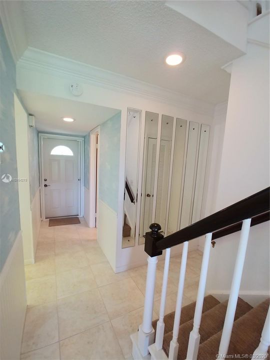 Entry way and stairs to bedrooms.