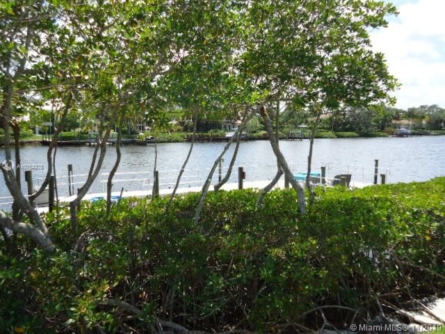 Community built along the Loxahatchee River leads to ocean.