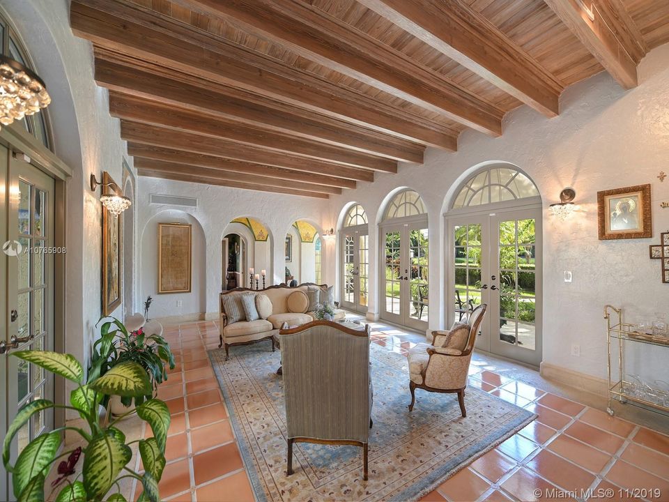 803 N. Greenway Dr., Coral Gables - Living room with exposed wood beams