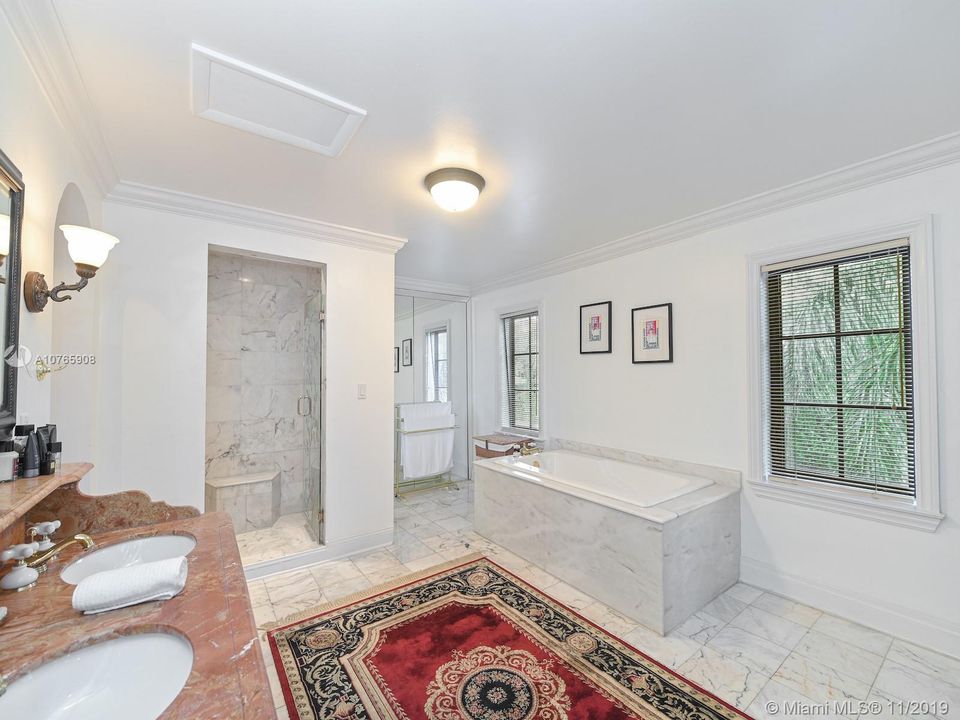 803 N. Greenway Dr., Coral Gables - Master Bathroom with tub and shower. Double sink, separate toilet and bidet room.
