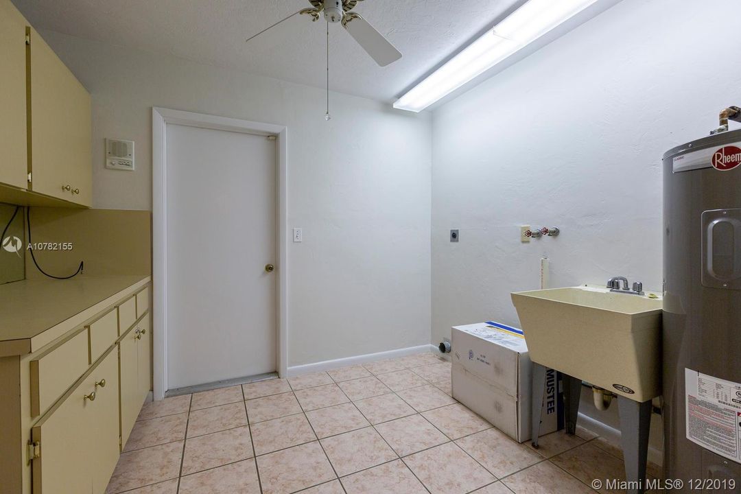 Laundry Room with access to garage