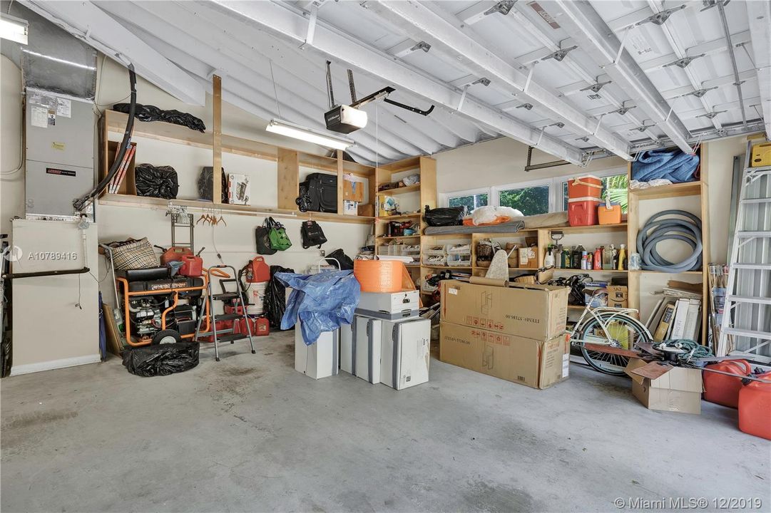 Two car garage plus storage racks