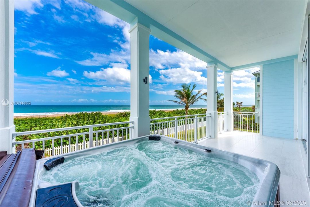 Second floor balcony with 6 person hot tub.