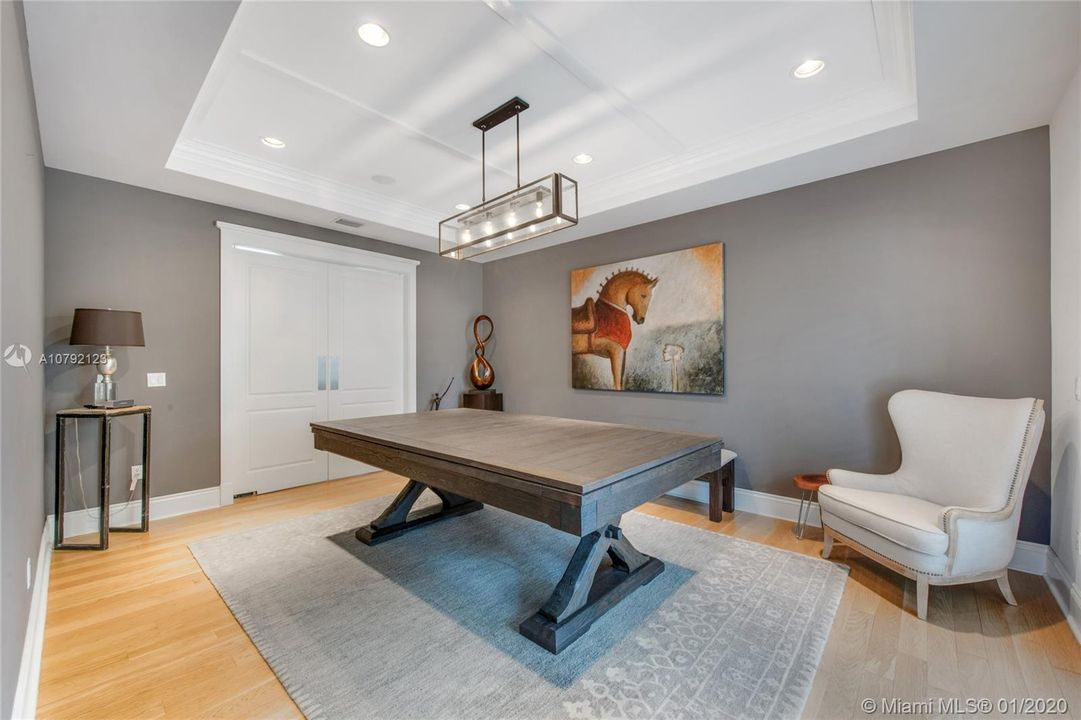 Formal Dining Room. Double doors lead to Kitchen. Beautiful coffered ceiling.