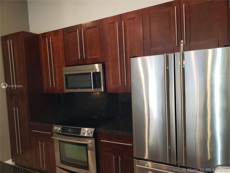 Kitchen looks like it is brand new.