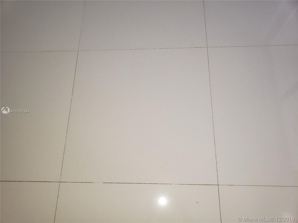 Large cut tile is throughout the home.