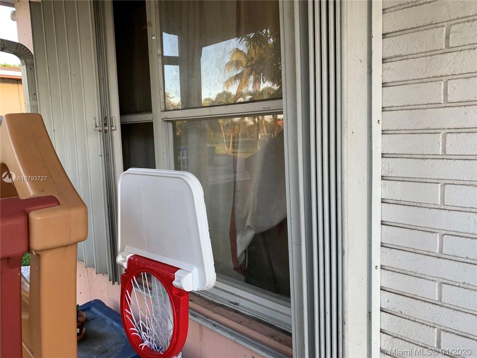 Accordion shutters on some windows (not all)