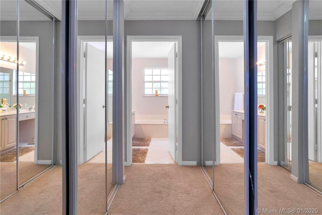 Two master closets, one a walk-in