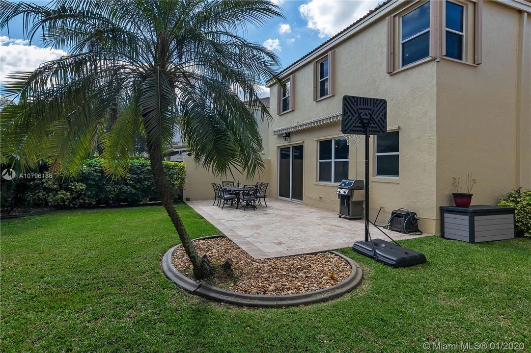 Entertain, grill, or play some hoops in your fully fenced well maintained back yard