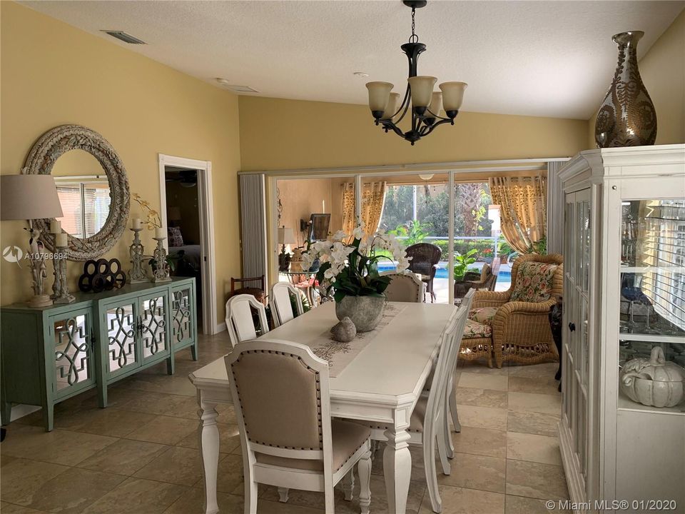 Spacious Dining Room overlooking the pool