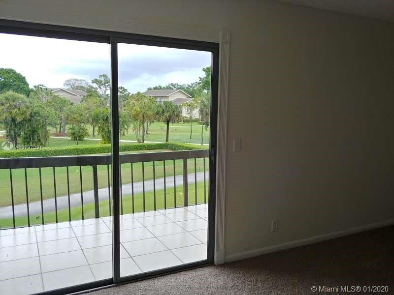 Master Bedroom private balcony with golf and water views