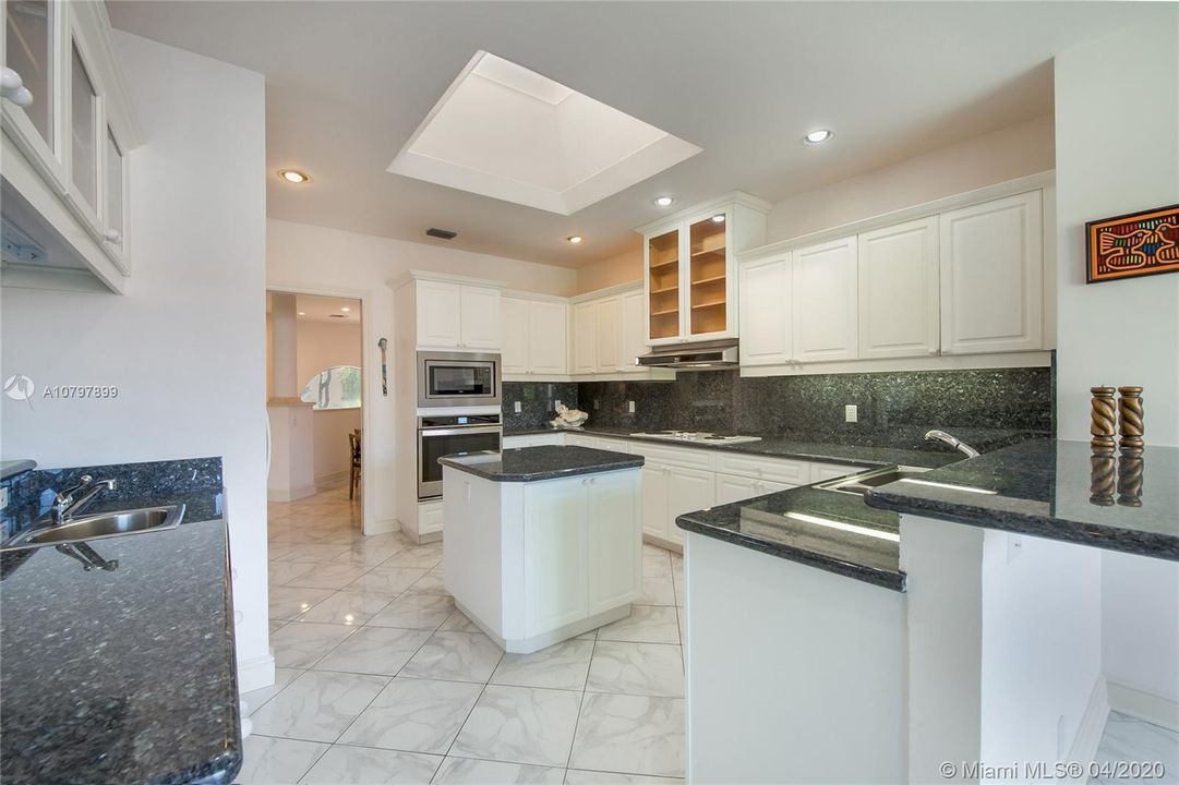 Big, Bright Kitchen Also Offers Views of Waterfall