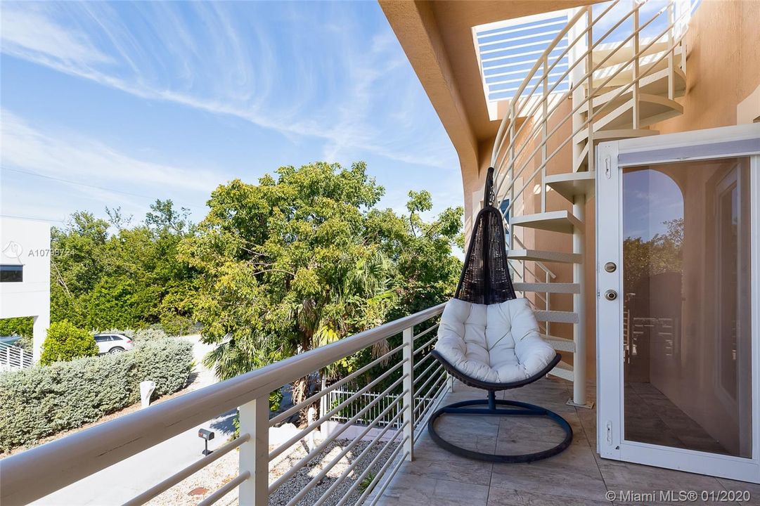 Porch with Staircase to Sunset Deck