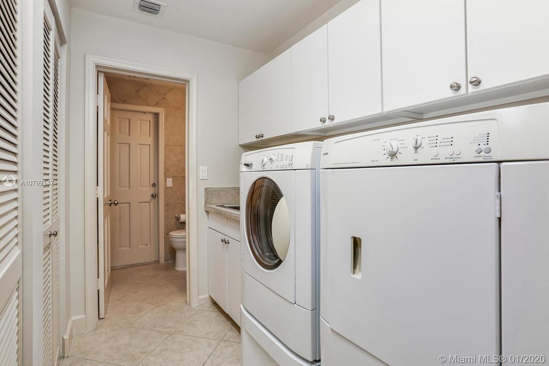 Separate Laundry Room. Cabana Bath Leads to the Pool.