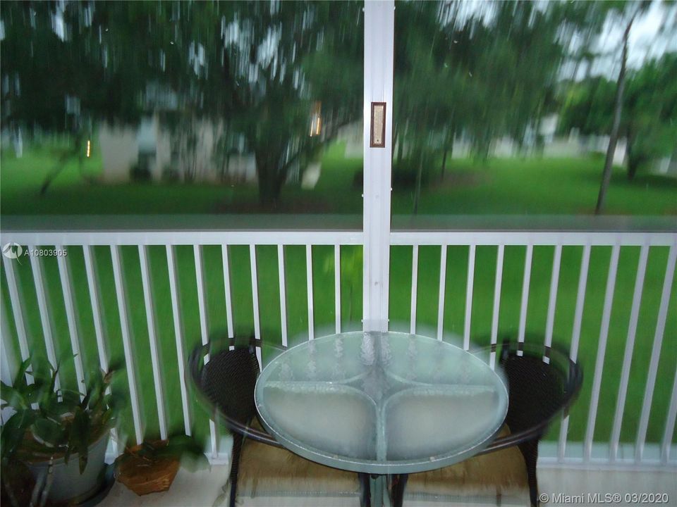 Relax on your large screed balcony.