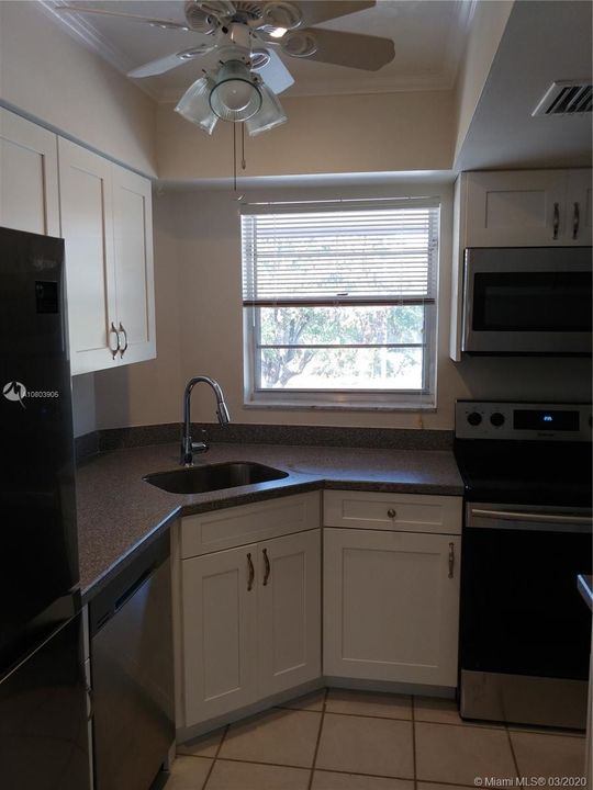 Redone, granite, new cabinets, SS appliances, fan and lights. Nice sunny window to over look the woods.
