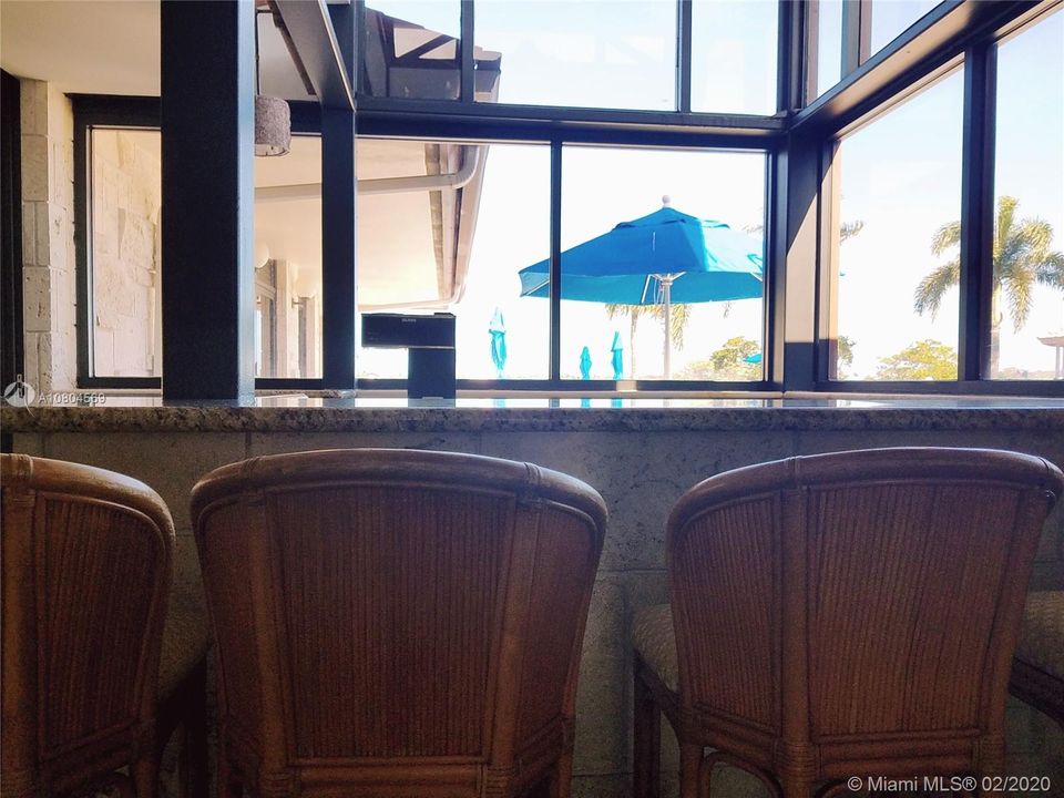 Have a cocktail at the clubhouse bar