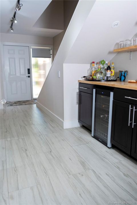 built in bar with wine cooler