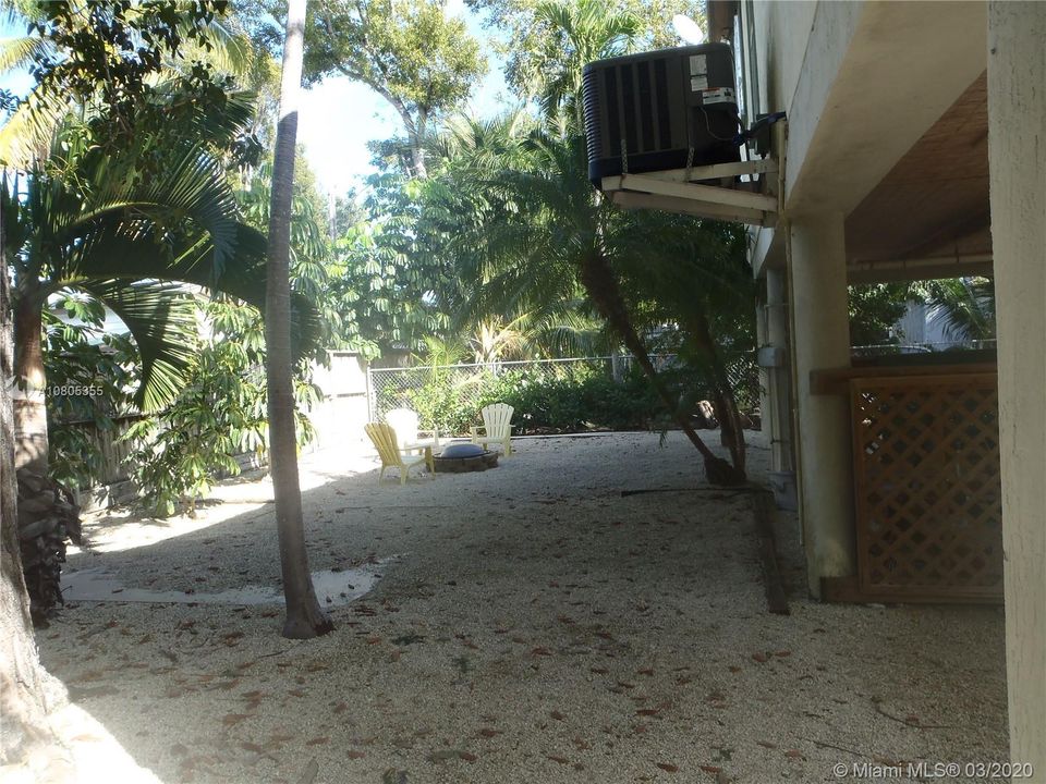 Rear Yard View, 60' x 100' Lot with Plenty of Open Yard Space, Ocean Side Property Across Community Boat Ramp & Park.