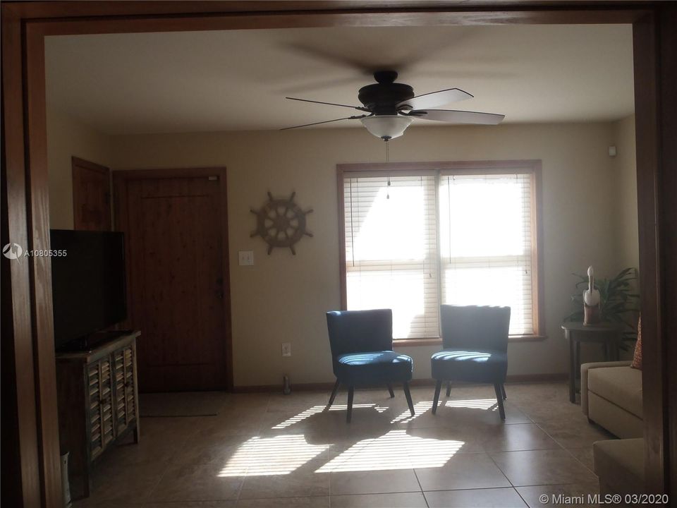 Living Room View 1, 60' x 100' Lot with Plenty of Open Yard Space, Ocean Side Property Across Community Boat Ramp & Park.