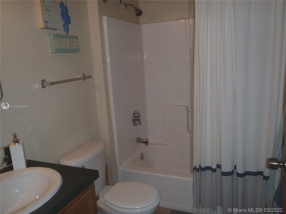 Guest Bathroom View 1, 60' x 100' Lot with Plenty of Open Yard Space, Ocean Side Property Across Community Boat Ramp & Park.