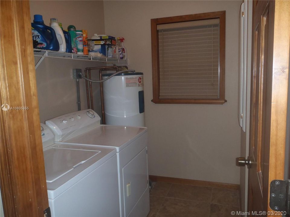 Laundry Room View 1, 60' x 100' Lot with Plenty of Open Yard Space, Ocean Side Property Across Community Boat Ramp & Park.