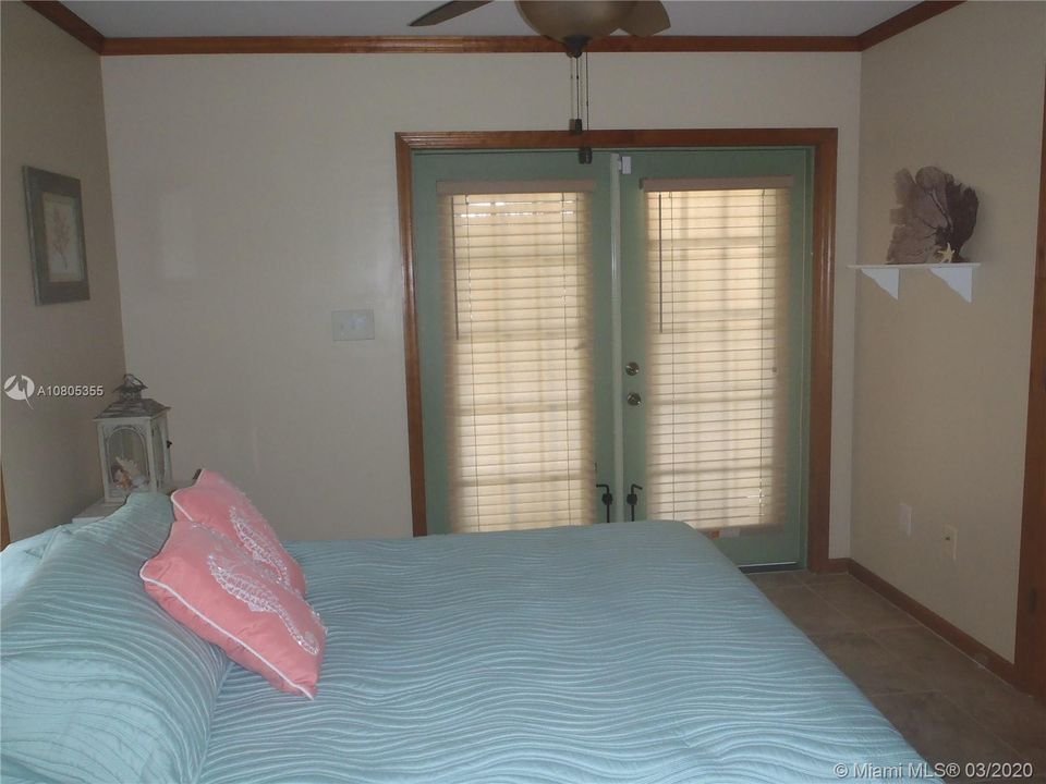 Master Bedroom View 2, 60' x 100' Lot with Plenty of Open Yard Space, Ocean Side Property Across Community Boat Ramp & Park.