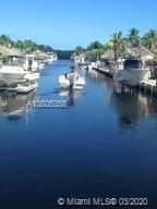 Main Canal Boating View from Community's Boat Ramp & Park. 60' x 100' Lot with Plenty of Open Yard Space, Ocean Side Property Across Community Boat Ramp & Park.